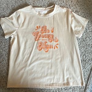 “be groovy or leave man” T shirt